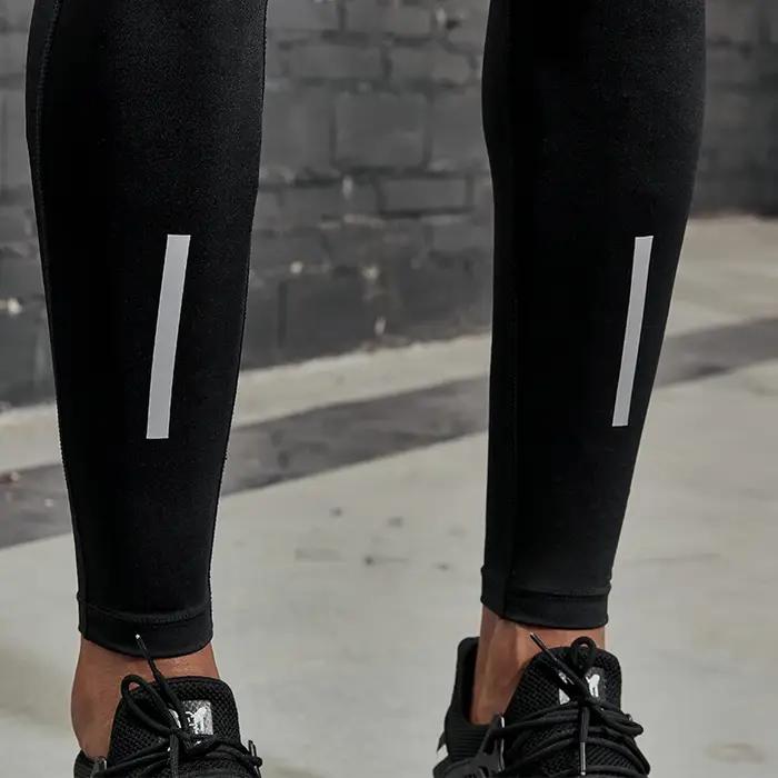 Pantalon de compression homme avec bandes réfléchissantes pour running basket-ball entraînement fitness confort sécurité