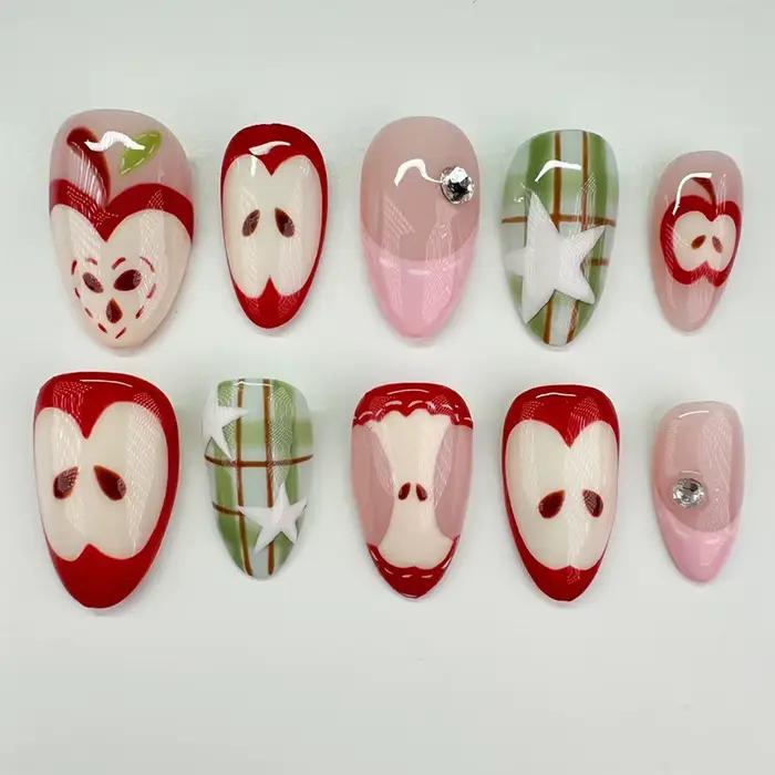 24 faux ongles courts en amande à presser, motif pomme rouge, avec strass ovales, à couverture compl