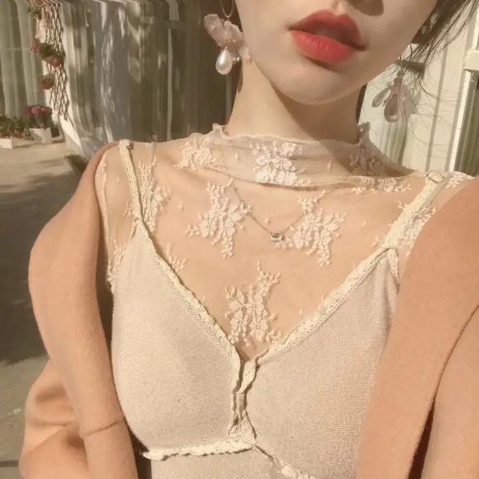 T-Shirts en maille pour femmes, chemisier en dentelle transparente, manches longues, hauts transpare