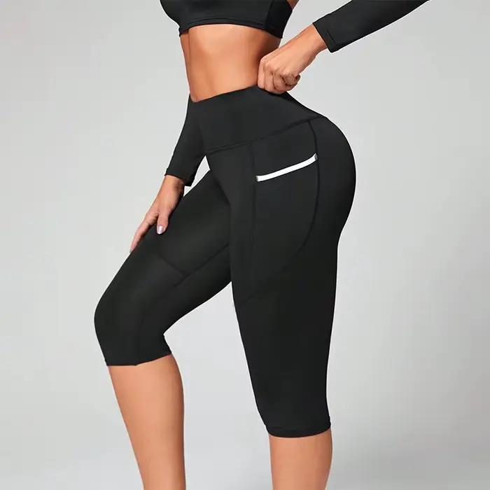 Pantalons de yoga taille haute Leggings capri avec poches pour femmes Leggings capri d'entraînement