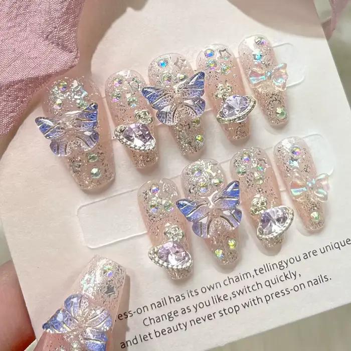10 pièces presse à la main sur les ongles grand planète conçu faux ongles avec papillon Art paillett