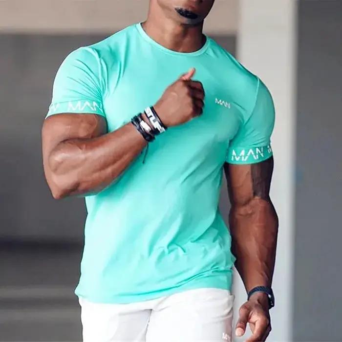 T-shirt compression homme pour gym et course - Haut sportif respirant d'été pour entraînement fitness