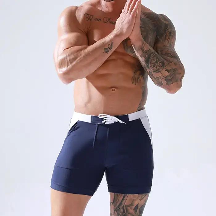 Maillot de bain extensible pour hommes, à séchage rapide, culotte de plage, avec poches, pour Sports