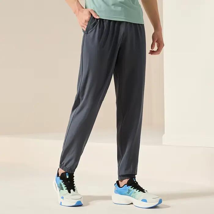 Pantalon de survêtement homme été respirant Xtep - Confort sportif quotidien pour activités plein air