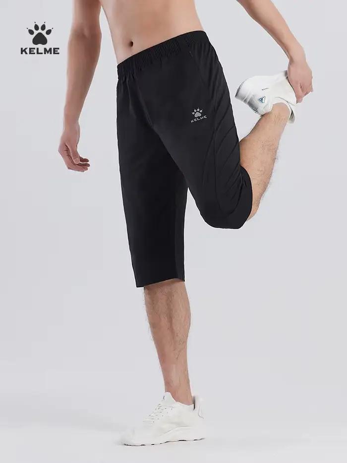 Capris de sport Kelme respirants homme - Short fitness football et course été