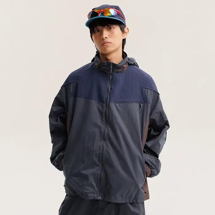 Veste cargo à capuche décontractée et ample pour homme et femme, imperméable, design à empiècements,