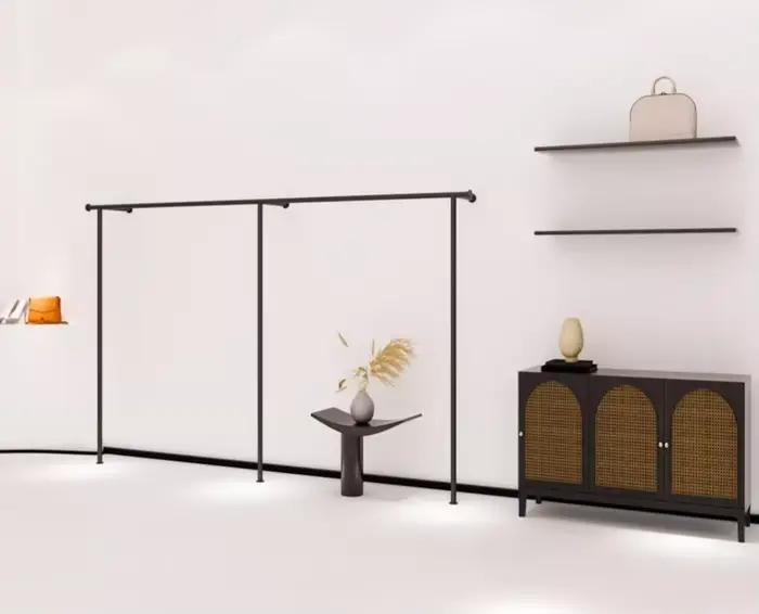 Présentoir mural pour magasin de vêtements