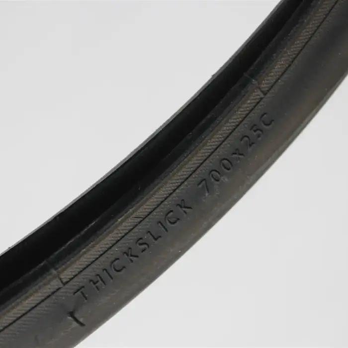 Pneu de vélo de route Freedom ThickSlick 23c ultraléger avec lames de course pour performances élevées et durabilité sur pistes de compétition et randonnées