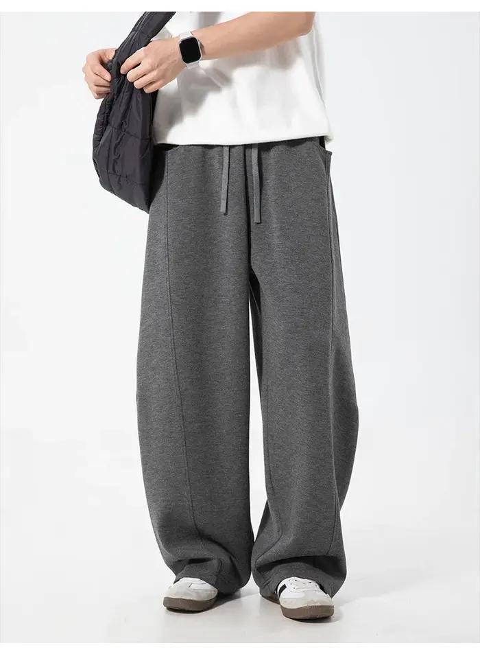 Pantalon décontracté texturé à coutures fendues pour hommes, surdimensionné, jambes incurvées, drapé