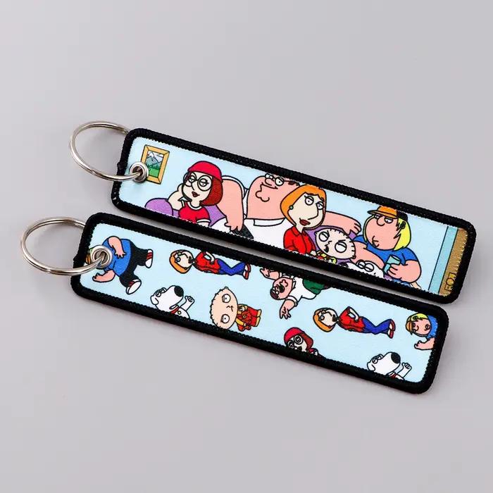 Personnages mignons Jet Tag nouvelle étiquette de clé de broderie porte-clés pour motos voitures sac