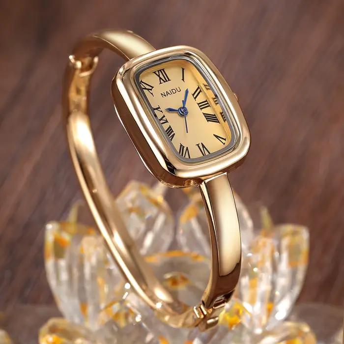 Montre pour femme décontractée, polyvalente, simple et à la mode avec affichage à l'échelle romaine