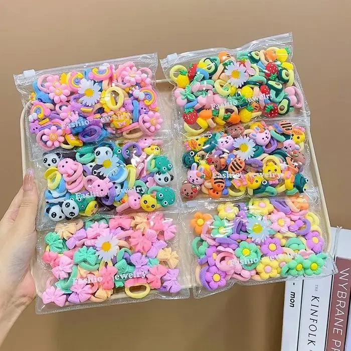 Bandes de cheveux élastiques en caoutchouc avec dessins animés mignons pour filles attaches de cheveux douces pour les enfants occasions spéciales et tous les jours