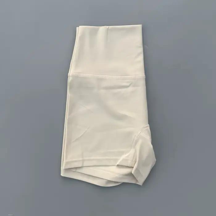 Couleur unie serré doux femmes Fitness Sport court taille haute Yoga court Legging Squatting preuve