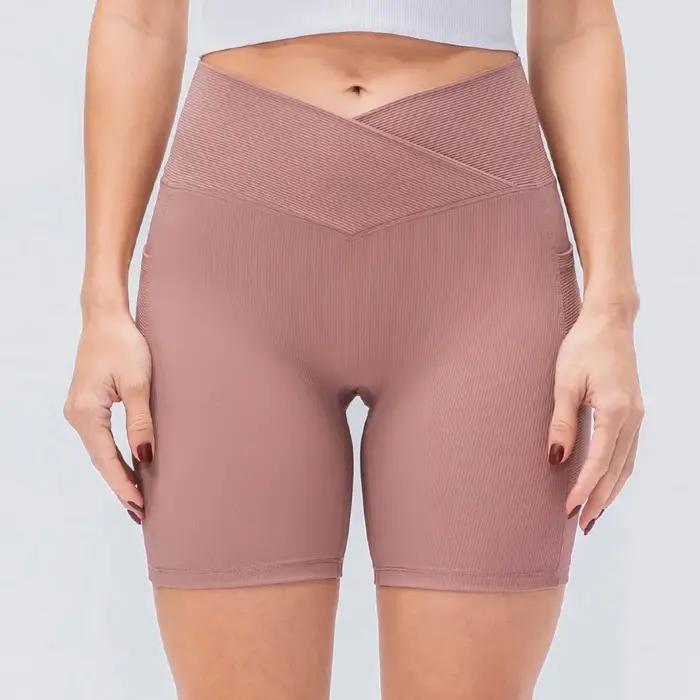 Shorts de yoga taille haute pour femmes avec poches, effet push-up, ajustés pour le fitness et la co