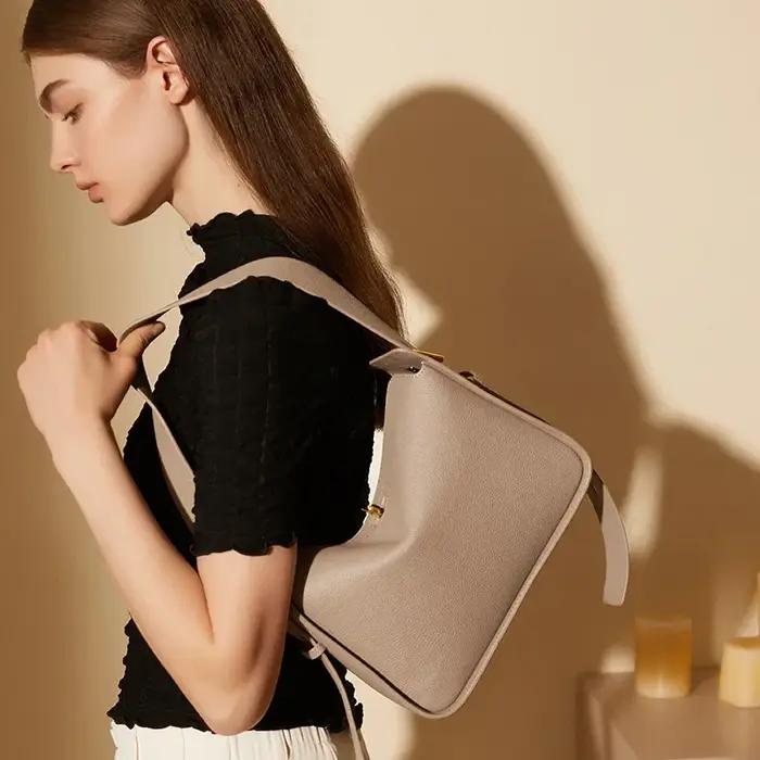 Sac à bandoulière en cuir de vachette véritable pour femme, design de niche, initié