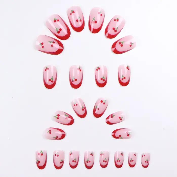 24 pièces mis à niveau votre look avec un ensemble de faux ongles cerise amande à bords rouges 1 lim