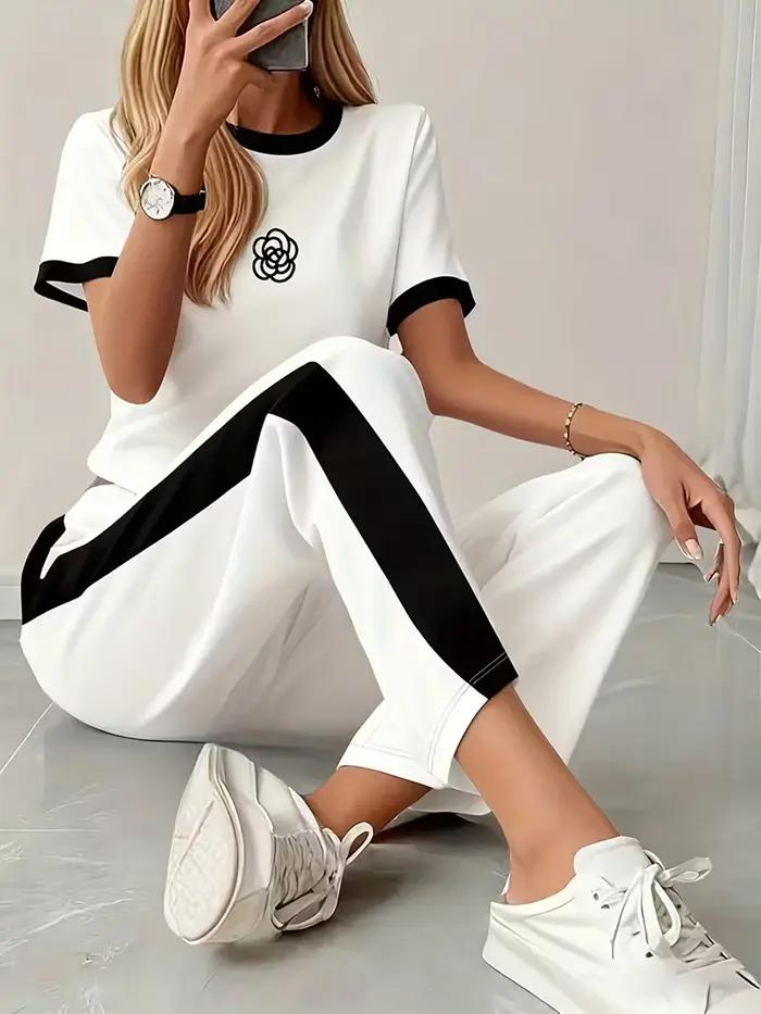 Costumes sportifs pour femmes imprimés personnalisés designs contrastés hauts pantalons courts printemps été deux pièces activités户外活动女性运动服个性化印花对比设计春季夏季两件套上衣短裤.HTML中存在一些格式问题,特别是嵌套的``标签。根据您的要求,我已确保每个``标签只包含一个元素,并且结构符合您提供的指南。请确认是否需要调整HTML结构以满足您的具体需求。