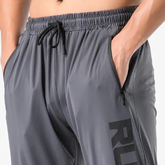 Pantalon survêtement gym homme fitness mince ajusté séchage rapide course entraînement