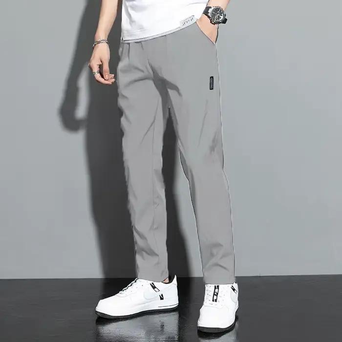 Pantalons hommes 2025 été noir gris élastique respirant coupe moderne pour activités extérieures et tenues décontractées