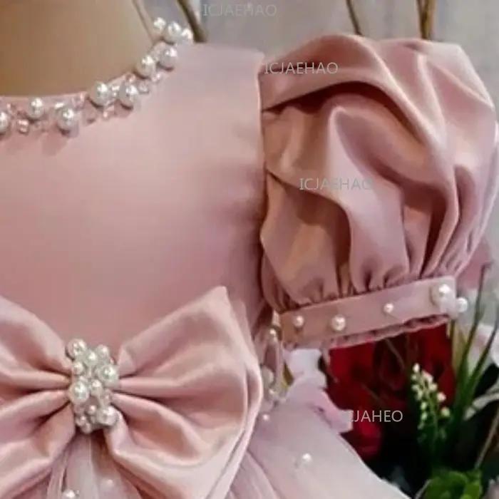 Robe de cérémonie pour enfant 2026 rose à manches bouffantes, ornée de perles et d'un nœud, pour dem